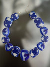 Tile-inspired resin necklace in blue and white — handmade in Goa | Shivaani Vaishnavi
