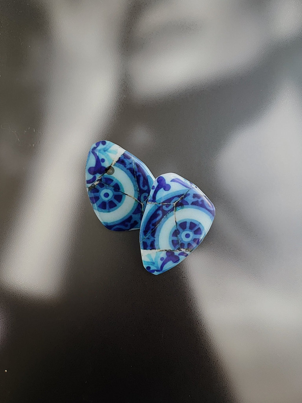 Tile-inspired resin stud earrings in blue and white — handmade in Goa | Shivaani Vaishnavi