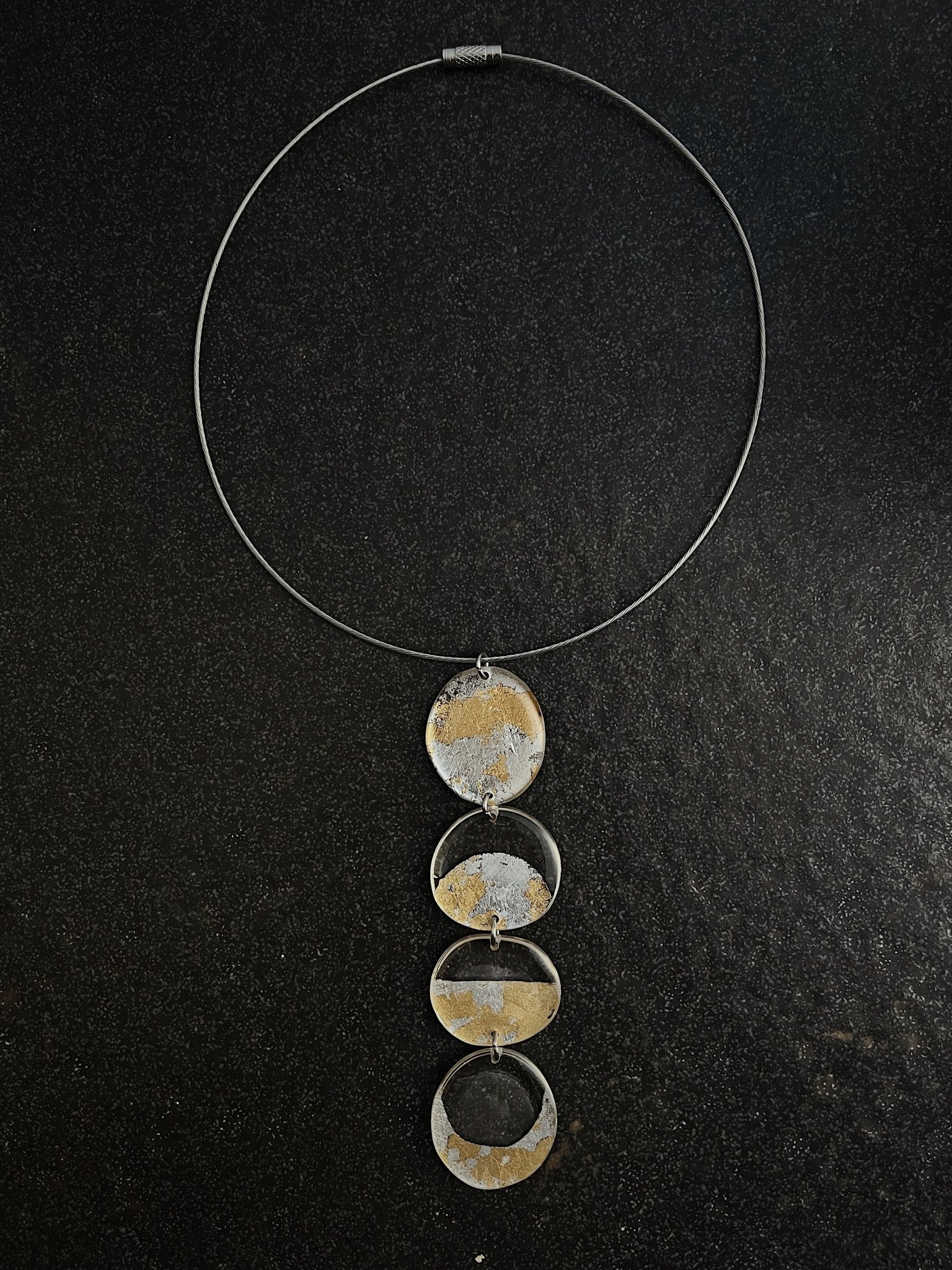 Handmade resin jewellery — moon phase necklace in gold and silver detail | Shivaani Vaishnavi