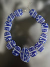 Tile-inspired resin necklace in blue and white — handmade in Goa | Shivaani Vaishnavi